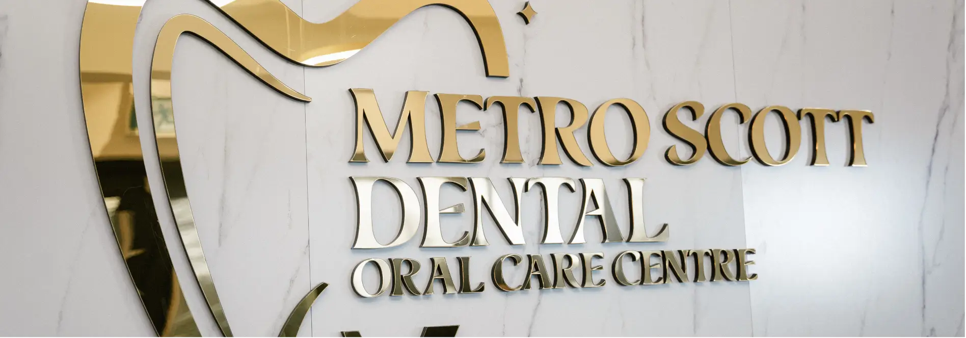 Reception area with Metro Scott Dental logo